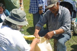 Caroline Trapper and late Eddy Trapper making sinew
